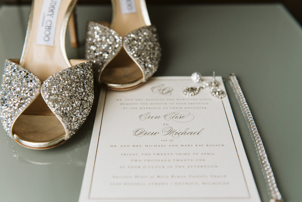 Wedding invitation with shoes and ring