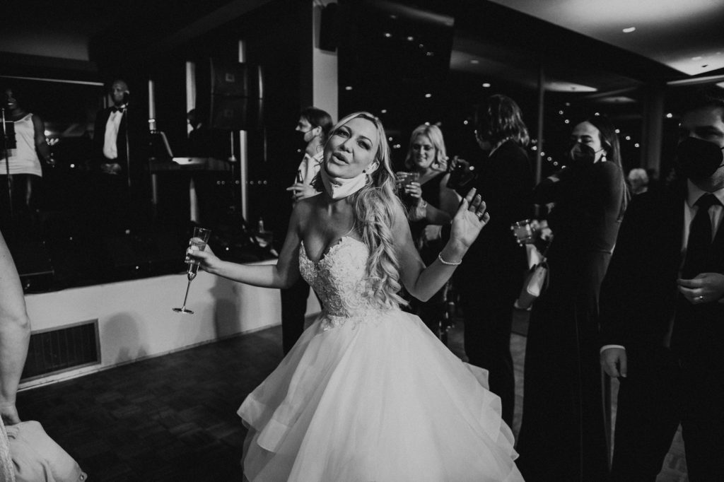 Bride laughing and dancing